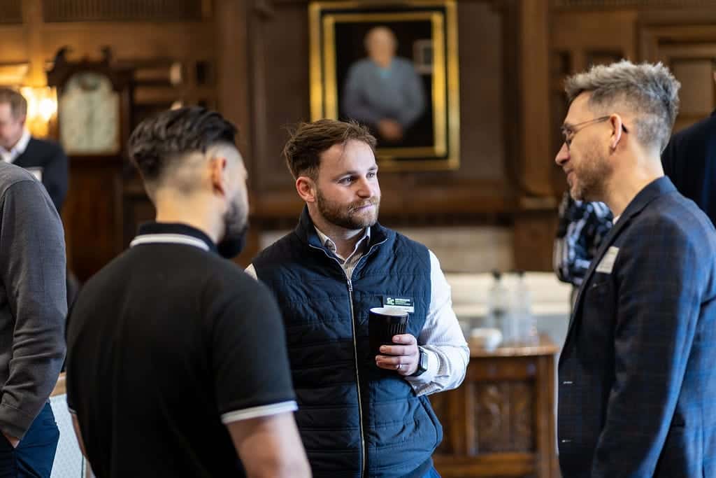 Business professionals networking at The London Golf Club.