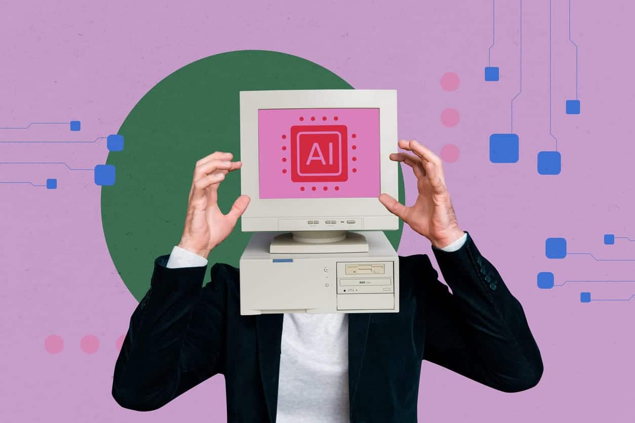 Person with a vintage computer monitor displaying AI icon in front of a pink and purple background.